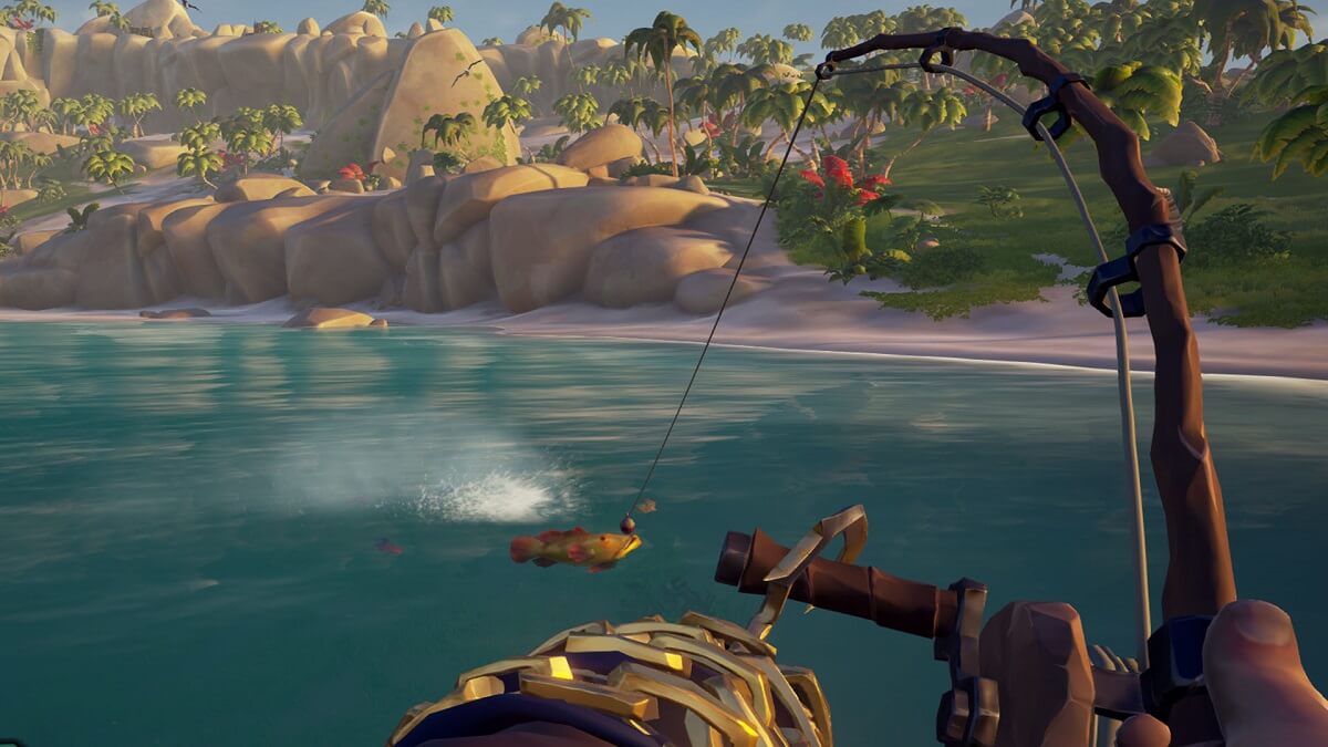 A player catching a fish in Sea of thieves.