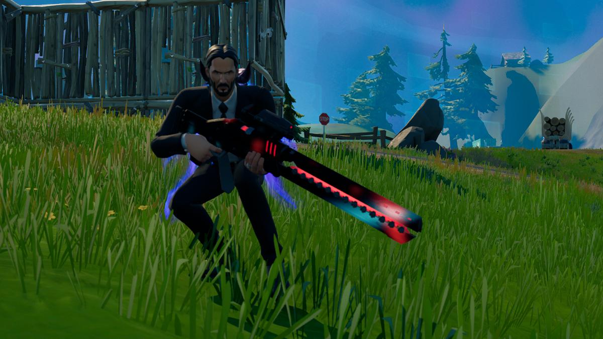 John Wick holding a Rail Gun in Fortnite.